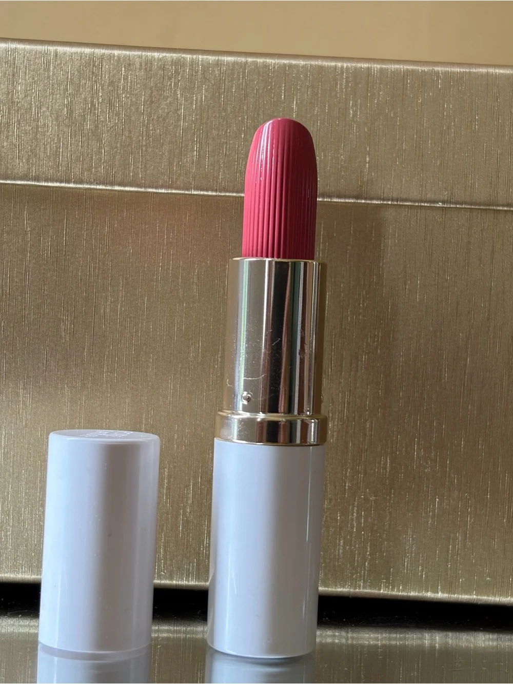 Estee Lauder cream pure color envy cream lipstick in shade eccentric